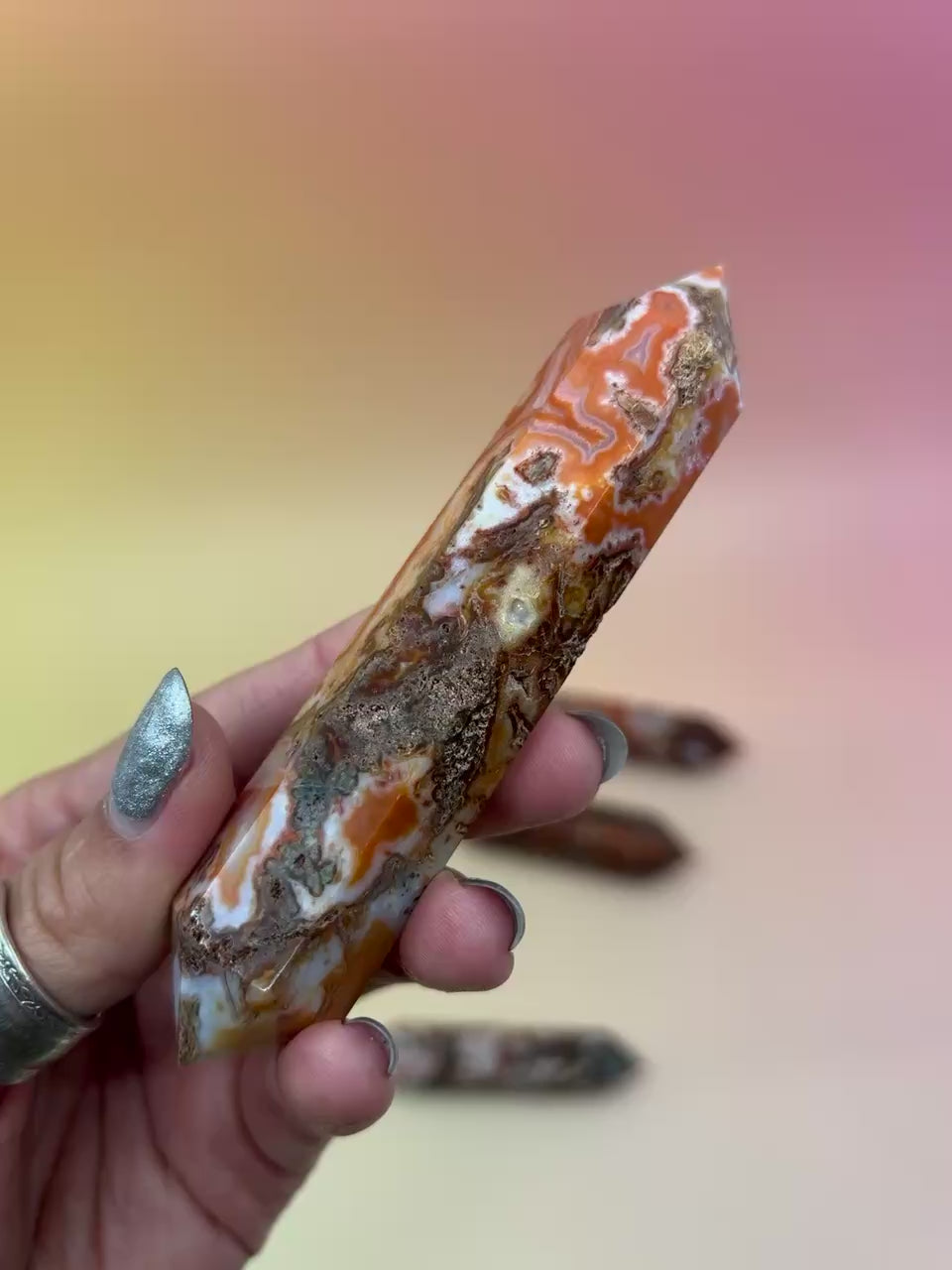 red moss agate on an orange background