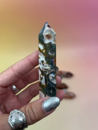 red moss agate on an orange background
