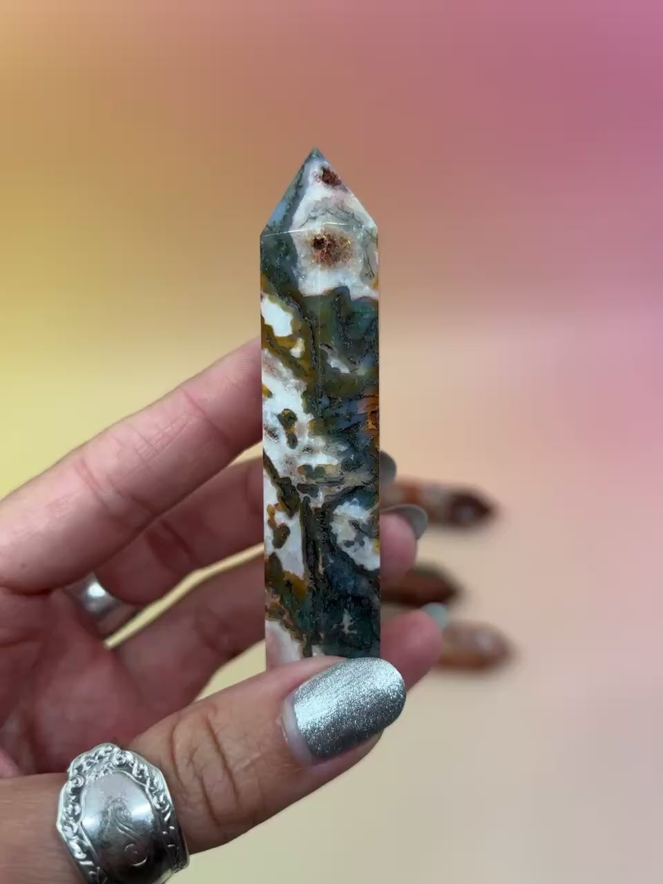 red moss agate on an orange background