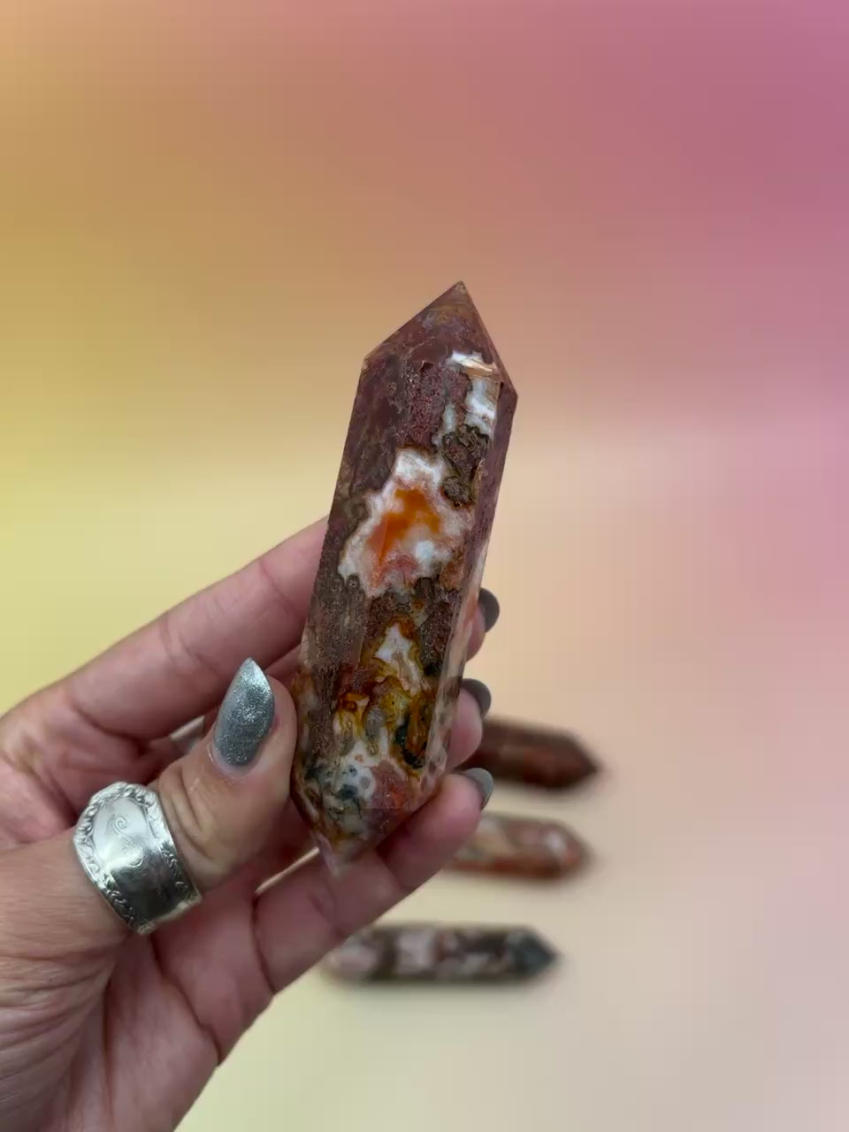 red moss agate on an orange background