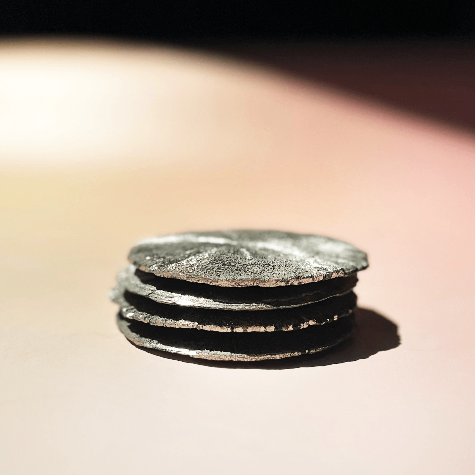 Stacked natural pyrite sun discs with metallic gold shine, unique crystal formation for protection and abundance