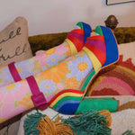 Top view of rainbow suede platform shoes with cushioned insole.