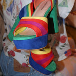 Rainbow suede peep toe pumps front view with colorful faux suede design.