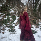 Retro 1970s velvet maxi dress with fringe bell sleeves