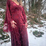 Bohemian velvet maxi dress with dramatic fringe sleeves