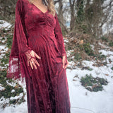 Bohemian velvet maxi dress with dramatic fringe sleeves