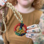 Bohemian hemp necklace with colorful wrapped pendant