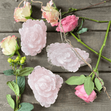 Rose quartz crystal flower carving polished from natural pink quartz gemstone