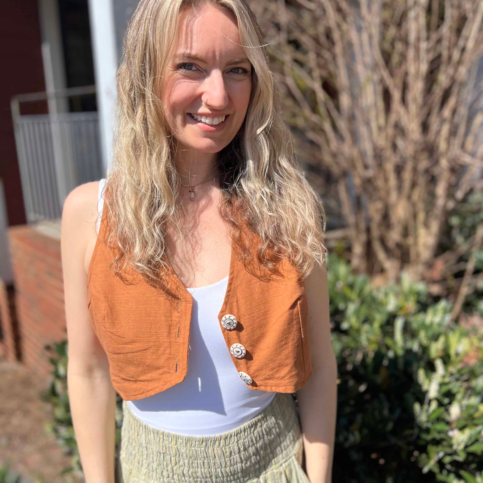 Rustic stripe fitted cotton vest - model in full outfit with striped pants and cropped vest