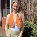 Rustic stripe fitted cotton vest - model in rustic vest with greenery in background
