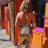 Gold jumpsuit styled for bachelorette party outfit