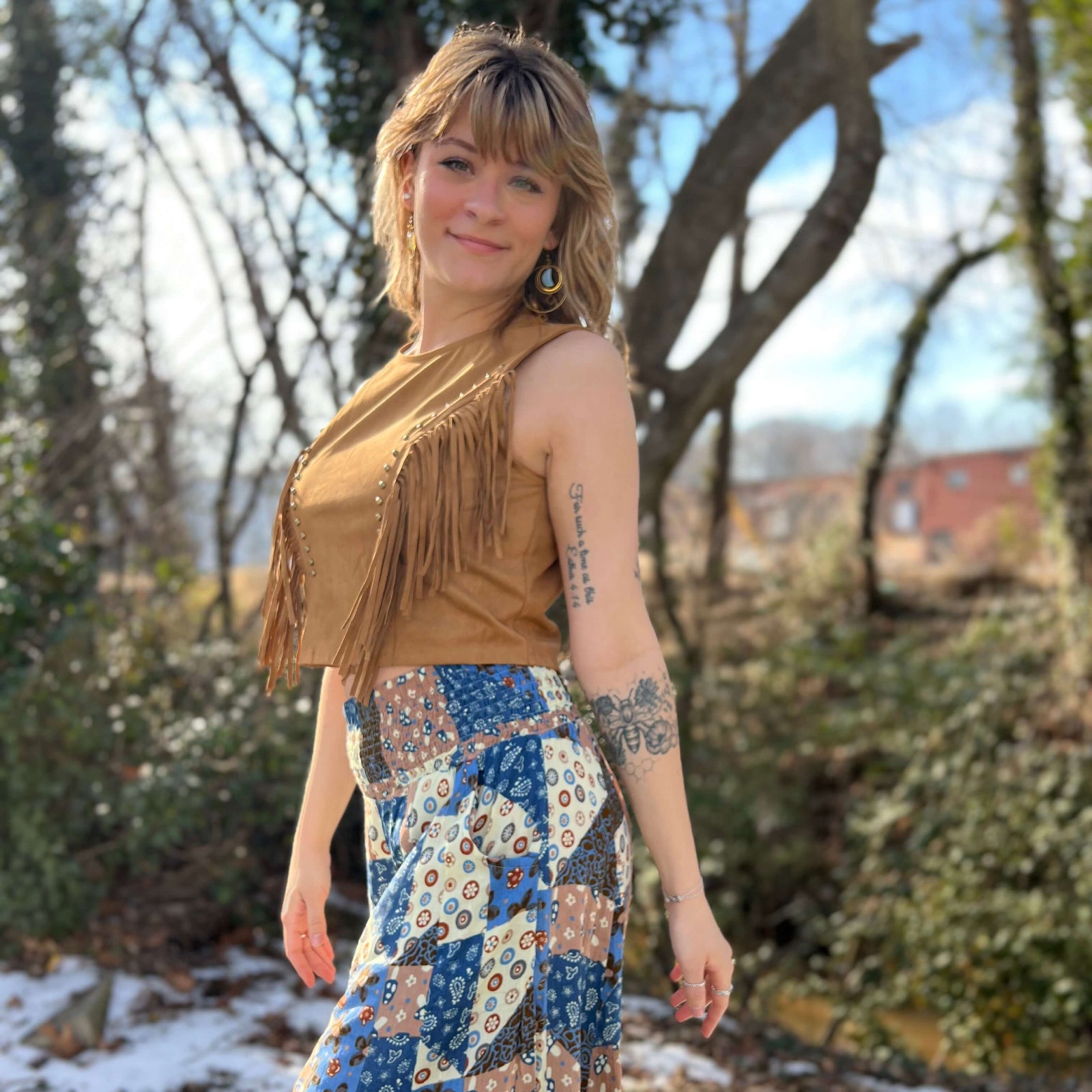 Boho fringe tank top with western inspired faux suede fabric and cropped fit