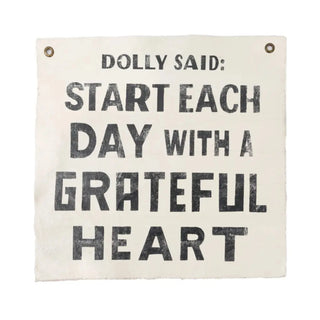 The Dolly Parton Iconic Quote Wall Hanging on a white background.