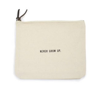 The "Never Grow Up" Iconic Quotes Canvas Zip Bag on a white background.