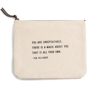 The D.M. Dellinger Iconic Quotes Canvas Zip Bag on a white background.