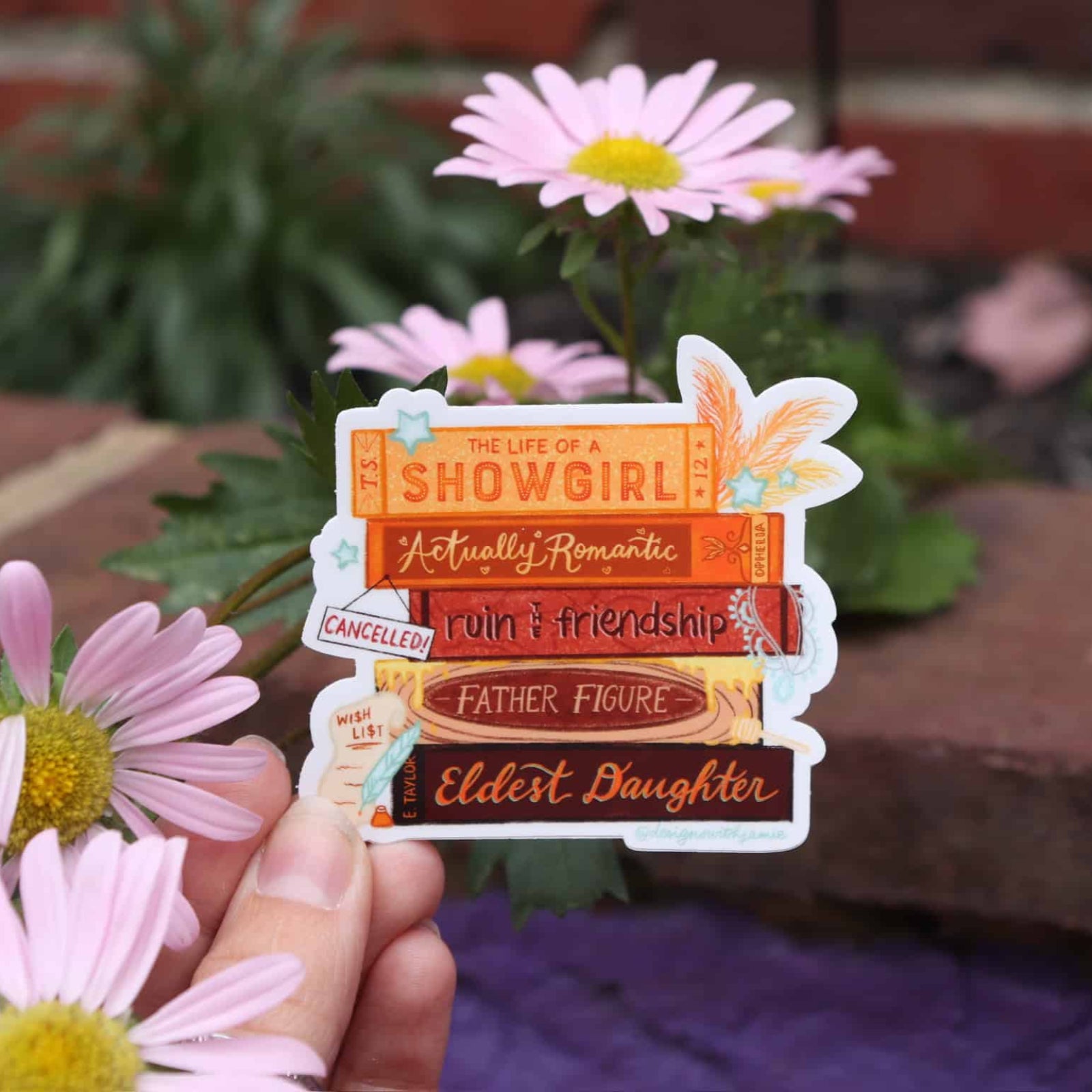 Life of a Show Girl Taylor Swift inspired bookish vinyl sticker with stacked book design.