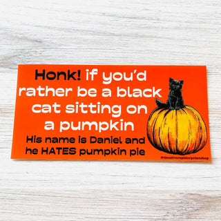 Black Cat Sitting On A Pumpkin - Bumper Sticker