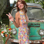 Multi-way rainbow jumpsuit styled for casual summer wear