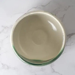 The Momiji Japanese Maple Mini Matcha Bowl on a white marble background.