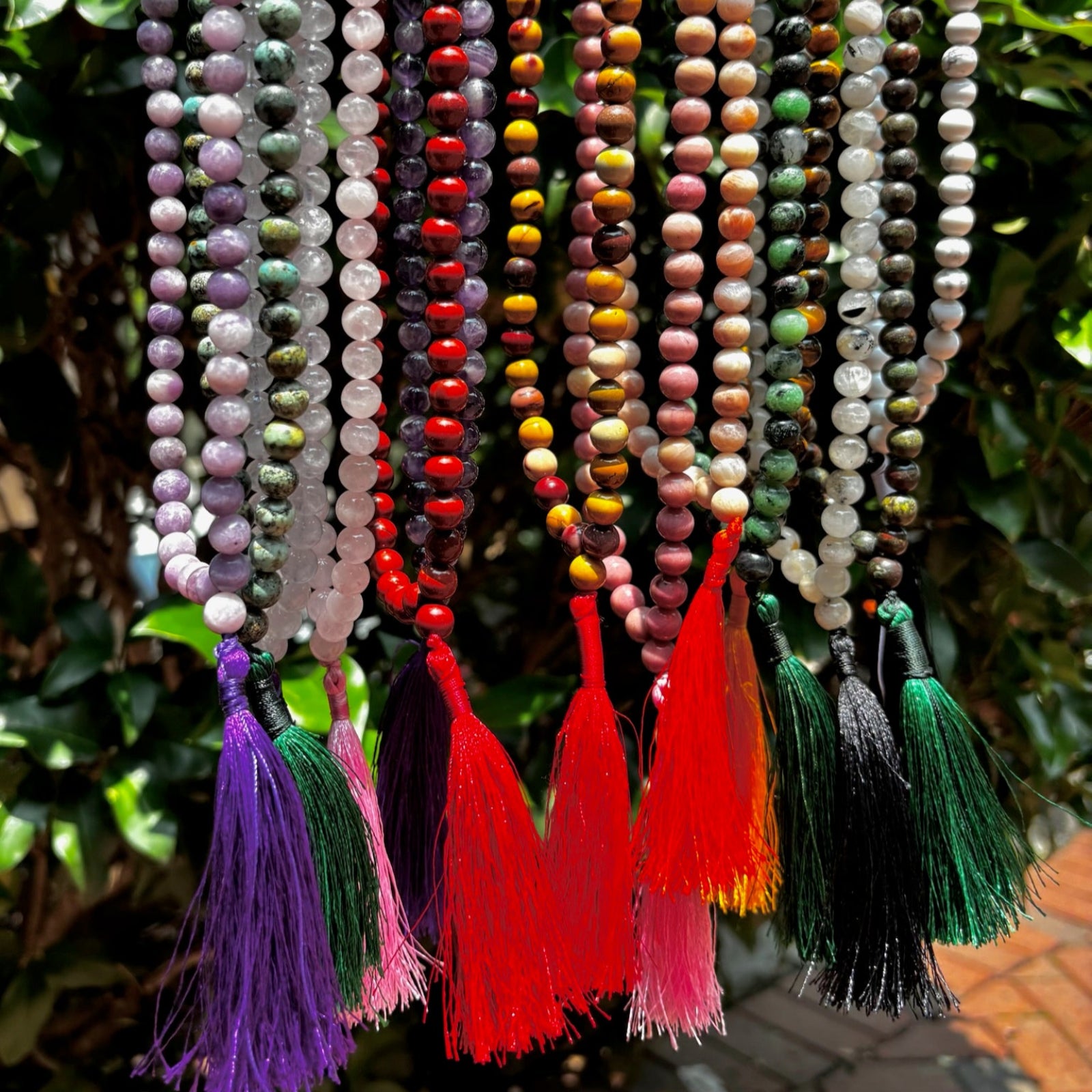 hanging malas with different color tassels 