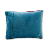 Needlepoint pillow with soft velvet backing used as a modern accent pillow