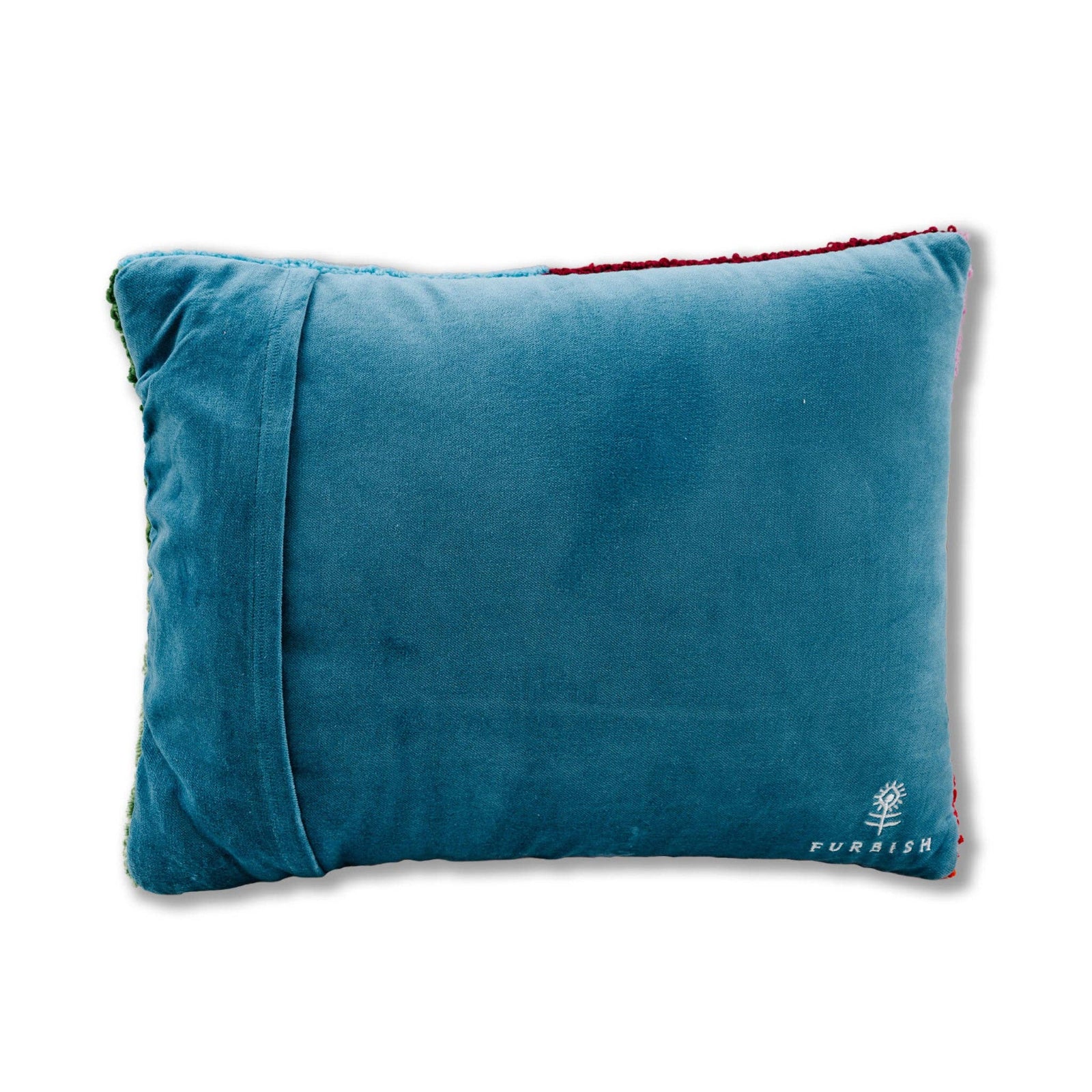 Needlepoint pillow with soft velvet backing used as a modern accent pillow