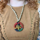 Colorful hippie peace necklace with braided hemp cord