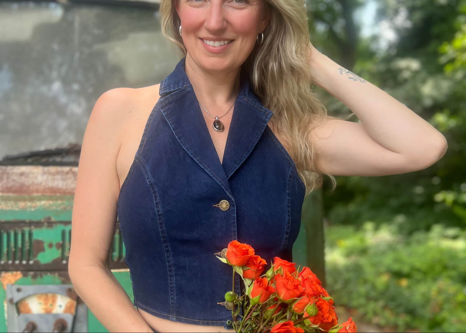 Women wearing layered outfits featuring sweater vests, long vests, and puffer vests