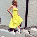 Yellow corset dress styled for summer fashion look