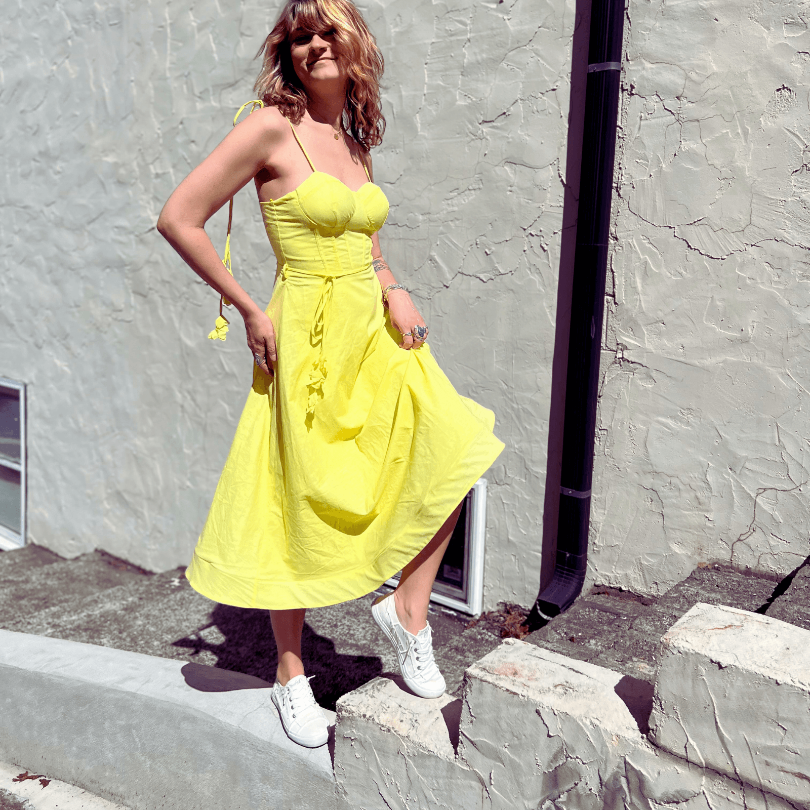 Yellow corset dress styled for summer fashion look